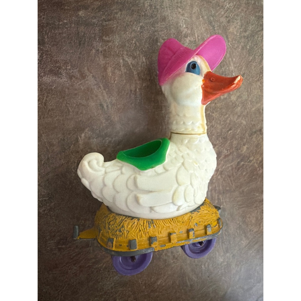 Vintage Plastic Mother Goose Pull Toy With Metal Base Purple Wheels Decor